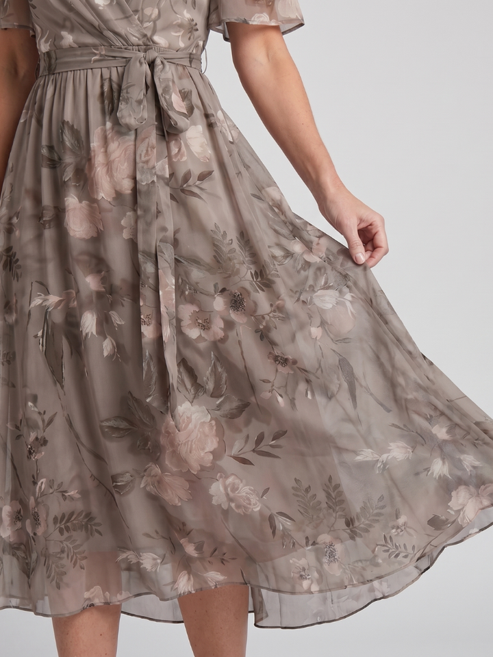Mirabel | Jurk met zwierende mouwen en gerimpelde taille in bloemenpatroon